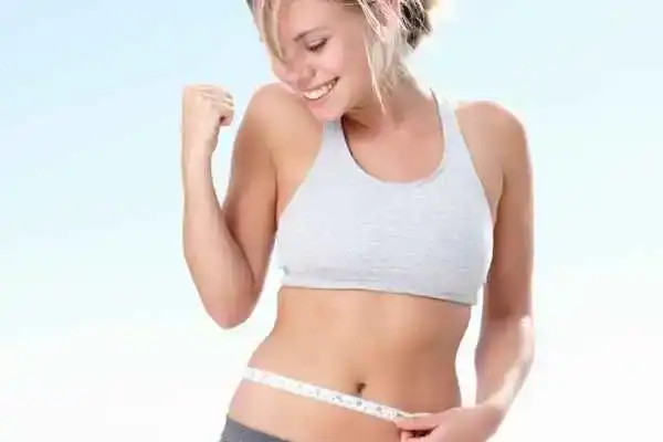 Unraveling the Mystery: Where Does the Body Fat Loss From First? 3 Image of woman happy with fat loss Warwickshire